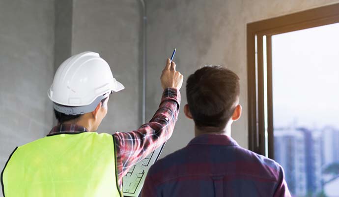 Constractor talking with Client