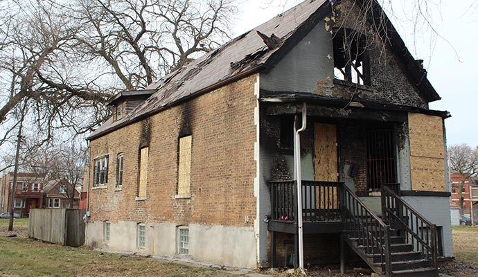 Board-up service for a fire-damaged house